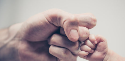 Fist Bumping a Baby