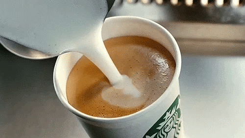 Pouring Milk into Coffee