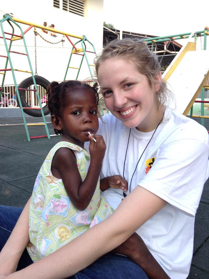 Missionary with a Child in Haiti