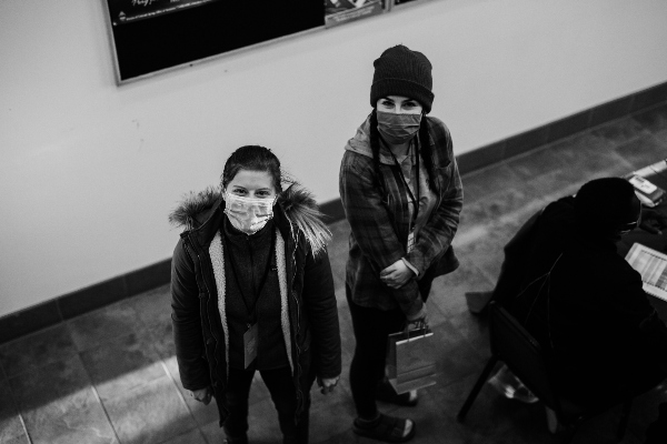 Two Girls with Masks Looking Up at SEEK21