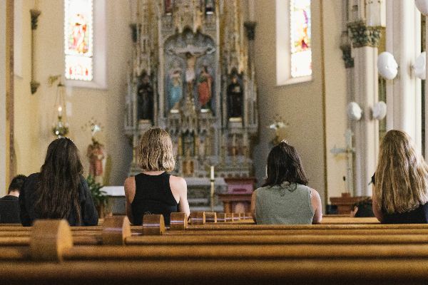 4 Female Students in a Church in Prayer